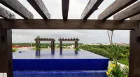 Charming 2-bedroom condo with WiFi, AC in wonderful Puerto Aventuras