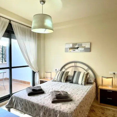 Apartment near beach with pools and hot tub