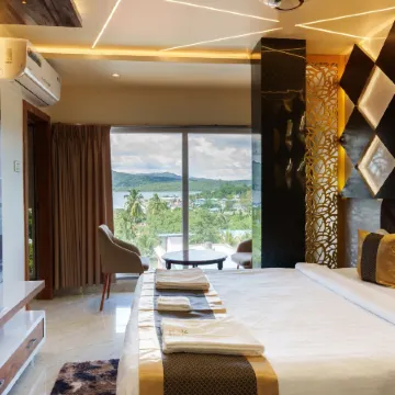 Olive Hotel and Suites Отели рядом с достопримечательностью «Корбинс Коув»