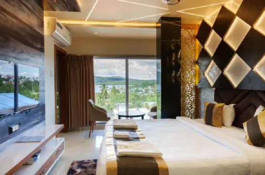 Olive Hotel and Suites Hotels near Murugan Temple