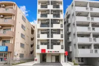 Mr.KINJO Miki24 in Front of Makishi Station - Condos
