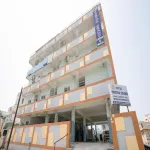 Iroomz Hotel Partha Grand Hotels near STBC Grounds