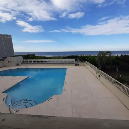 Bright and Beachy Oceanfront Condo - Linens included!