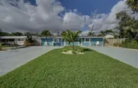 Less than a Mile to the beach! Walk to shops and beach! Villa pool house dream!