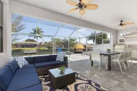 Deluxe 4BD/3BH Waterfront Home with Heated Pool and Golf Access and EV Charger