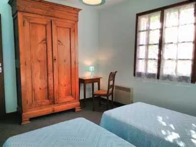 Gite with large swimming pool, play area, green space.