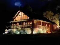 Log cabin at Vallectio lake with wrap around porch!