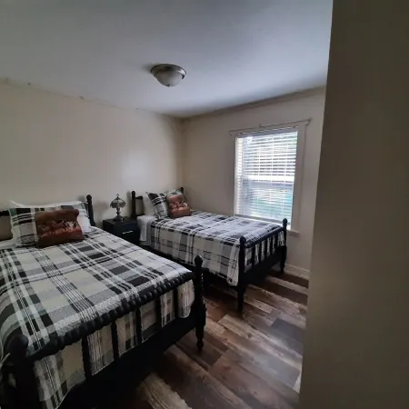 Cozy nestled in quiet neighborhood. On snowmobile and ATV trail.