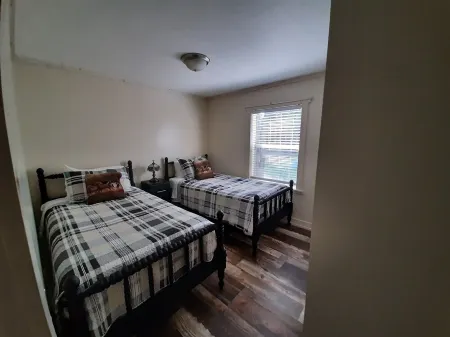 Cozy nestled in quiet neighborhood. On snowmobile and ATV trail.