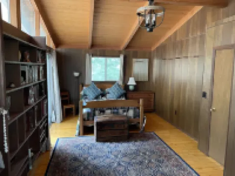 Secluded house with enclosed dog yard on 200 acre family estate