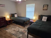 Charming 3-bedroom house with WiFi and AC a short drive from the beach!