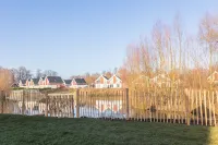 Newly built vacation home with many highlights (sauna, fireplace and first lake location)