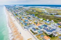 Ocean View, steps from sand, enjoy it all in your spacious 3-bedroom retreat