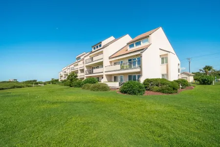 Beachwalk 115 - Pine Knoll Shores Oceanfront Condo! Steps to Beach. Sleeps 8!