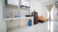 Cozy Living and Tidy 2Br at Puncak Dharmahusada Apartment Hotels in Tambaksari