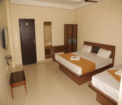 Santhosh Inn Hotels near Exide battery