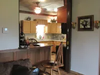 Restored rock house with hot tub and beautiful private deck.