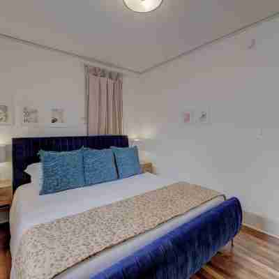 Vibrant Decor and Modern Amenities - Charming Urban Hideaway Rooms