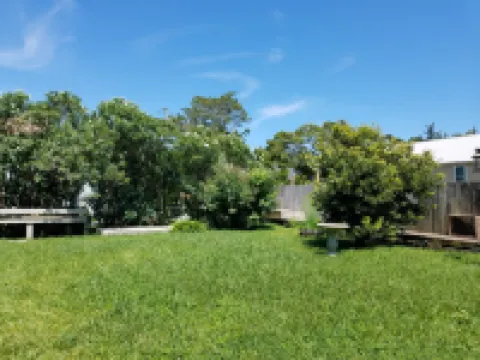 Charming Retreat with Screened Porch and Open Kitchen - Serene Escape