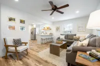 Dog-friendly home with a firepit, yard, washer/dryer, central AC & game room