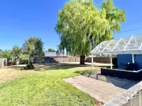 Charming Cottage with Outdoor Patio and Spacious Yard - Delightful Haven