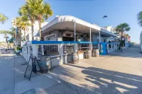 Expansive Deck and Community Swimming Pool - Gorgeous Oceanfront Haven