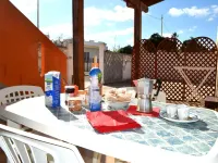 Casa vacanze Tanoshii al piano terra con spazio all'aperto e posto auto