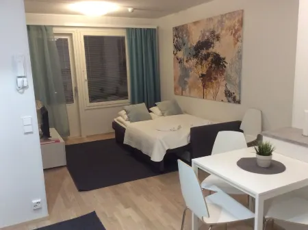 Kotimaailma Apartments Siljotie Отели рядом со станцией Железнодорожная станция Рованеми