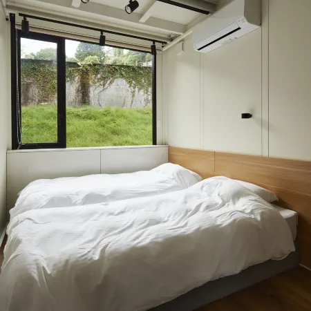 Sakanaya Stay Hot Spring Town Container Hotel Отели рядом с достопримечательностью «Железнодорожная станция Охито»