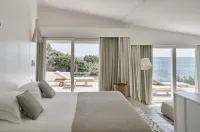 Falkensteiner Resort Capo Boi Hôtels à : Porto Sa Ruxi