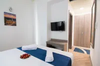 โรงแรมโอเมีย - ที่มีที่จอดรถ