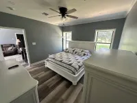 Charming 1-bedroom cottage in Ridge/Judice community with central AC/Heating.