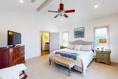 This 3 bedroom beach house is the PERFECT space to get “A Wave From It All