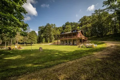 Cozy Log Cabin w/Hot Tub - King Bed - Private Acreage - Mississippi Getaway Hotels near Black Hawk Bridge