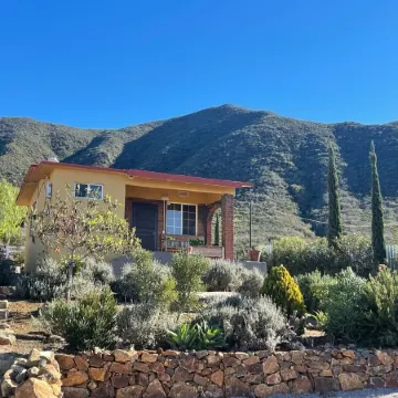 3 comfortable individuals cabins in a property with stunning views of the valley