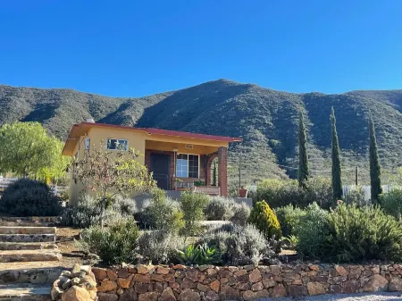 3 comfortable individuals cabins in a property with stunning views of the valley