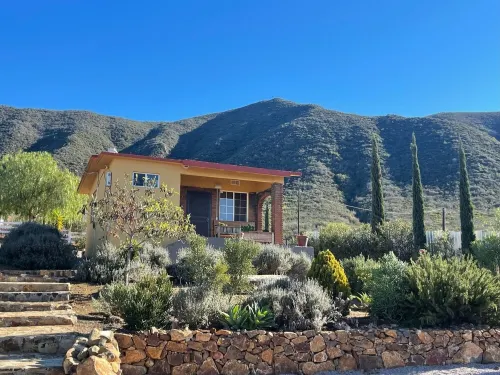 3 comfortable individuals cabins in a property with stunning views of the valley