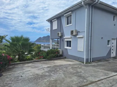 Villa Queen Diamond, vue mer Panoramique Отели в г. Ле Диаман