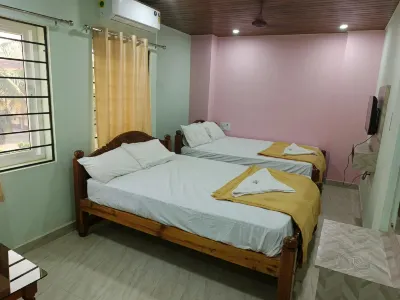 Grand Inn Lodging and Boarding Hotels near Honavar Store - Souvenir & Gifts