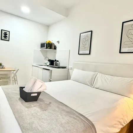 Oshun Cinco Torres Suites Отели рядом с достопримечательностью «Деловой центр "Четыре башни"»