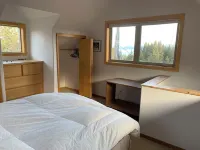 1 bed, 1 bath, breakfast included, full kitchen, washer/dryer, and rental car.
