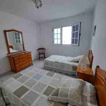 La Marea Casa en Arrieta, Tranquila. Cerca de Restaurantes y Playas de Arena Rooms