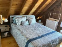 Delightful waterfront cottage with beautiful views of the sunset.