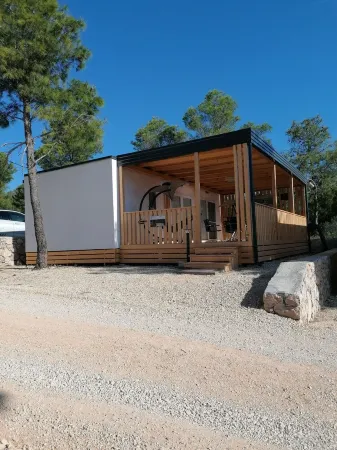 Newly built mobile home by the sea with large terrace Отели в г. Drage