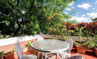 Casa Bianca by Red Olivenr Taj MG Roadpvt Garden