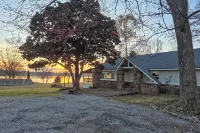 Deck & Yard: Wolf Creek Waterfront Home in Grove! - 3-Star