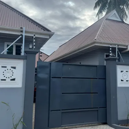 Ruby Homestays Отели рядом с достопримечательностью «Dar Es Salaam War Cemetery»