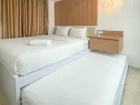Wooden Accents 1BR at Podomoro City Deli Medan Apartment By Travelio