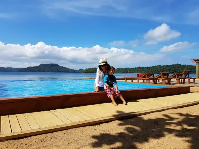 Mystic Sands Hotels near Ene'io Botanical Garden