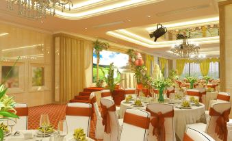 a large banquet hall with multiple tables and chairs set up for a formal event , possibly a wedding reception at Tien Loc Palace Hotel